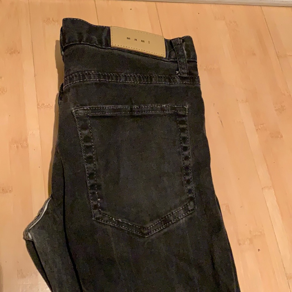 Black jeans ripped knees